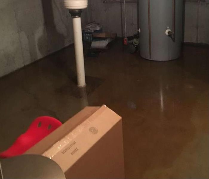 flooded basement in morristown, nj. a few inches of standing water in basement from a storm