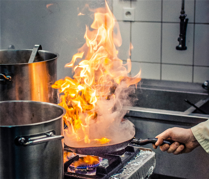 photo of cooking fire in a commercial kitchen 